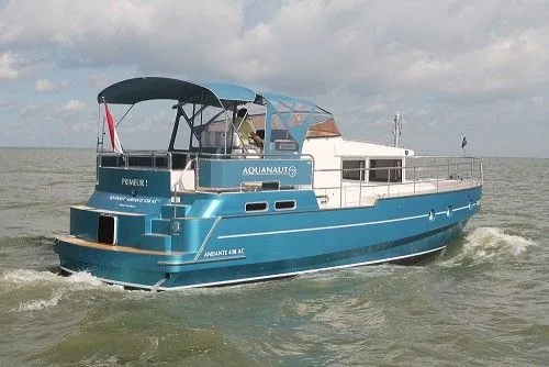 Explore Sneek on a 13.15m 4 Cabin House Boat Rental
