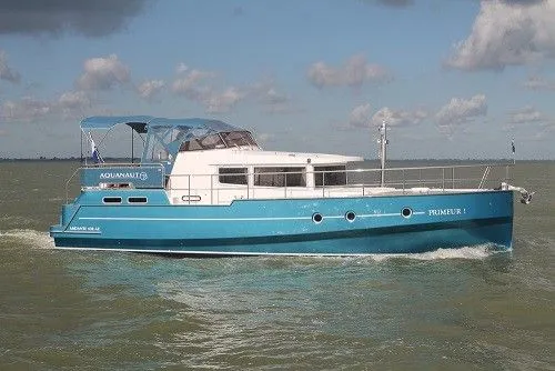 Explore Sneek on a 13.15m 4 Cabin House Boat Rental