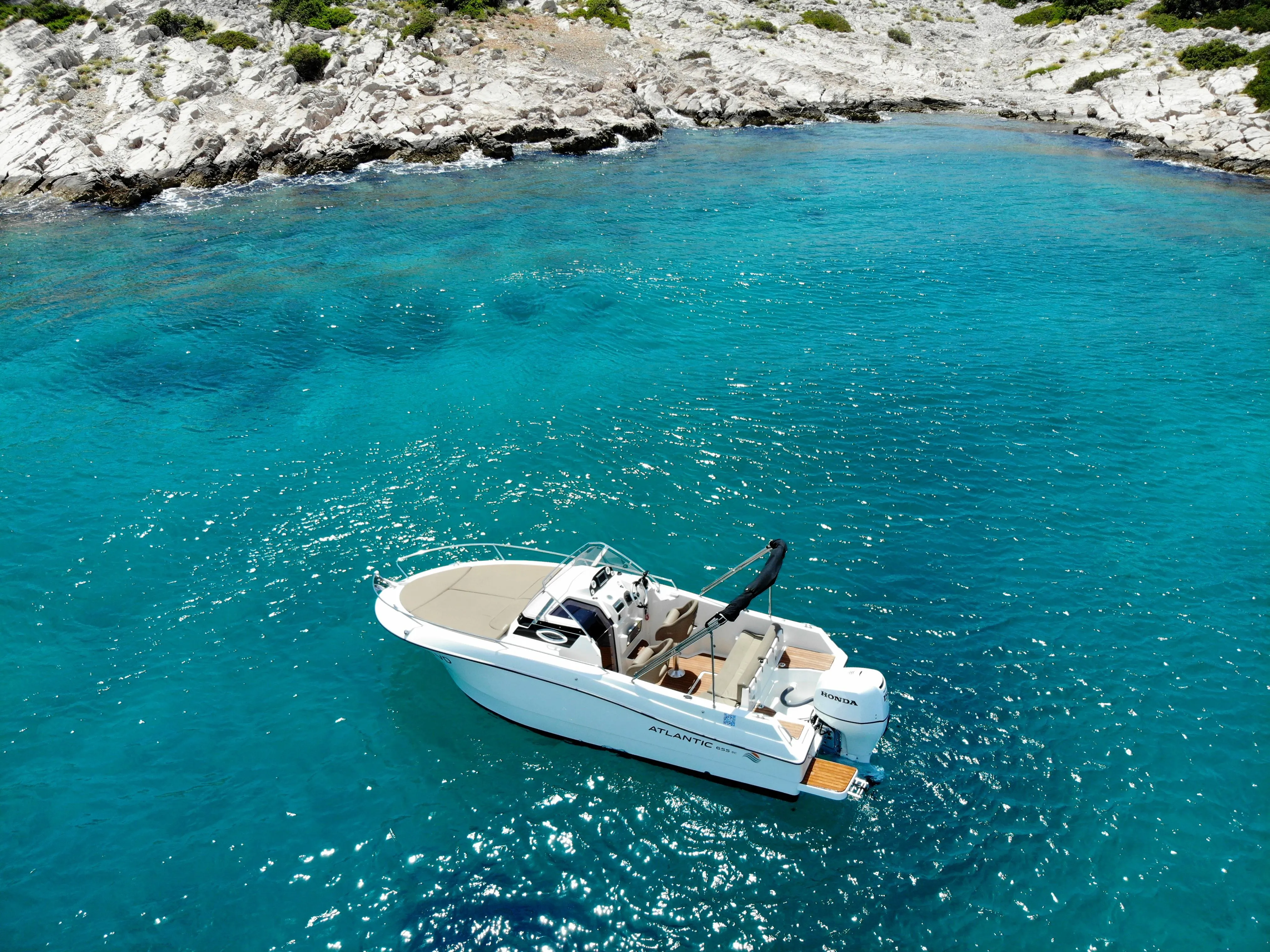 Explore Vodice on a 6.9m Rental Motor Boat Atlantic Marine 655