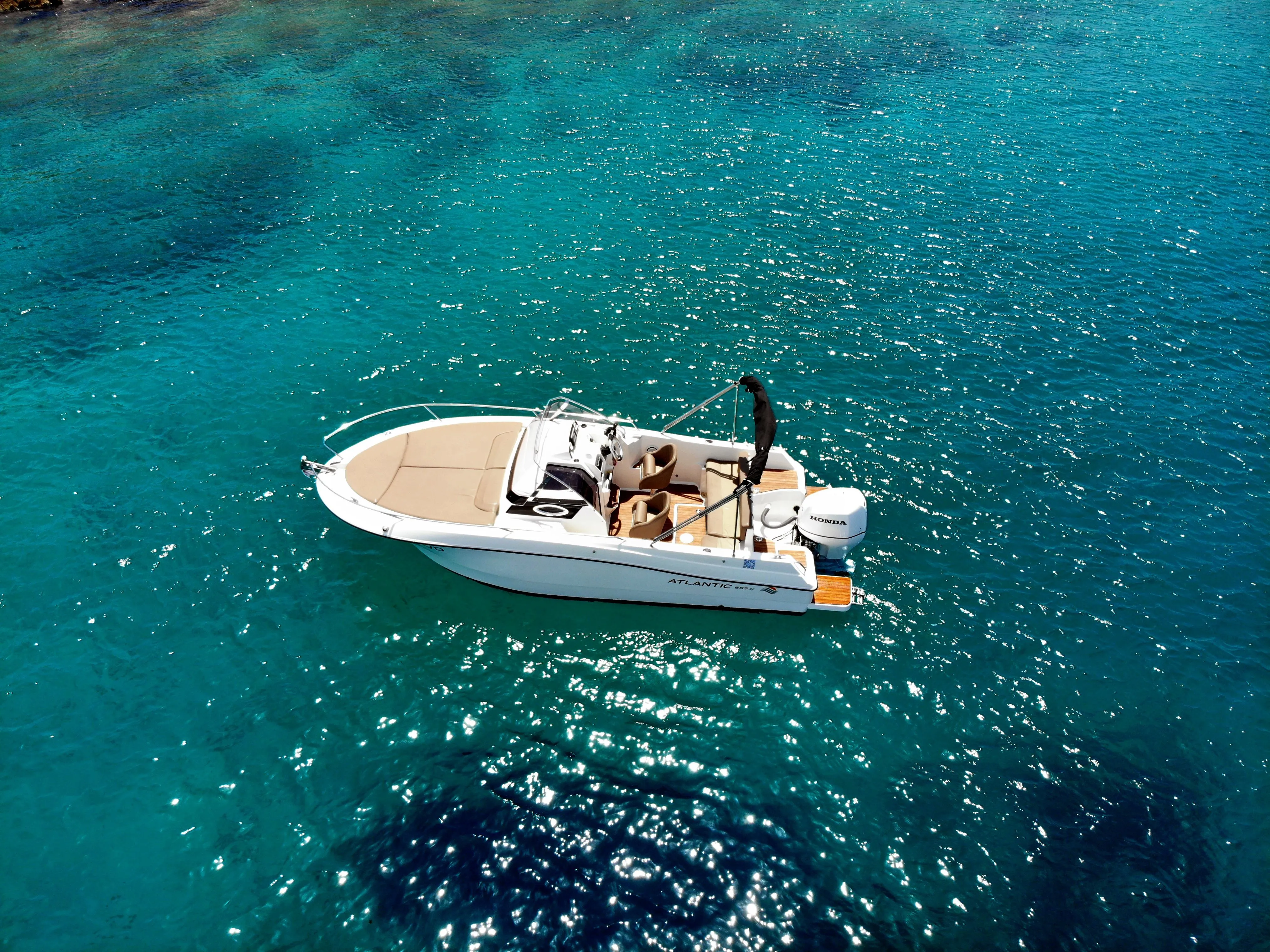 Explore Vodice on a 6.9m Rental Motor Boat Atlantic Marine 655