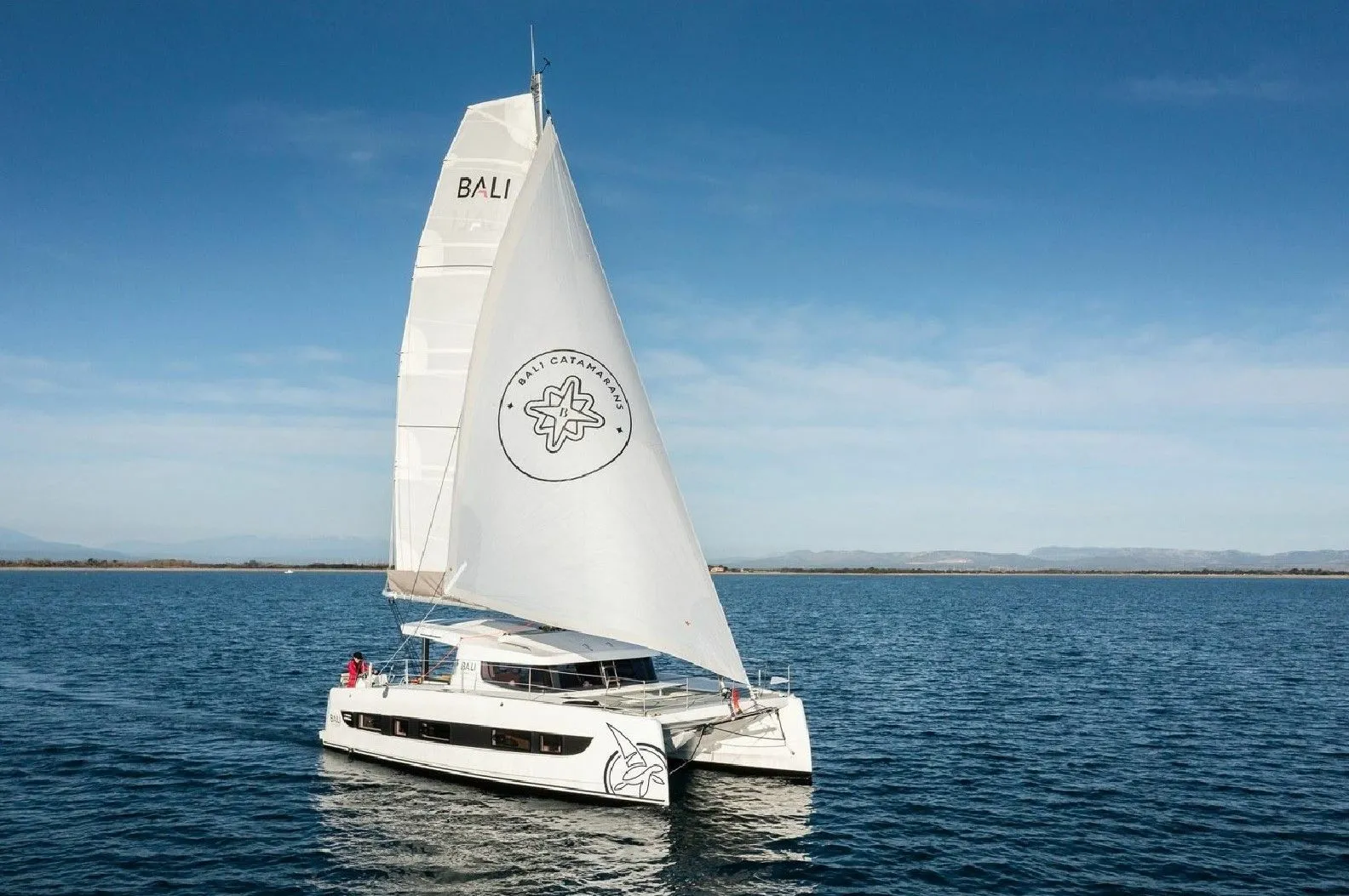 Explore Castelldefels on a 11.8m Rental Catamaran Bali Catsmart
