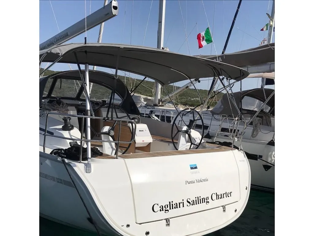 Explore Cagliari on a 14.27m Rental Bavaria Cruiser 46