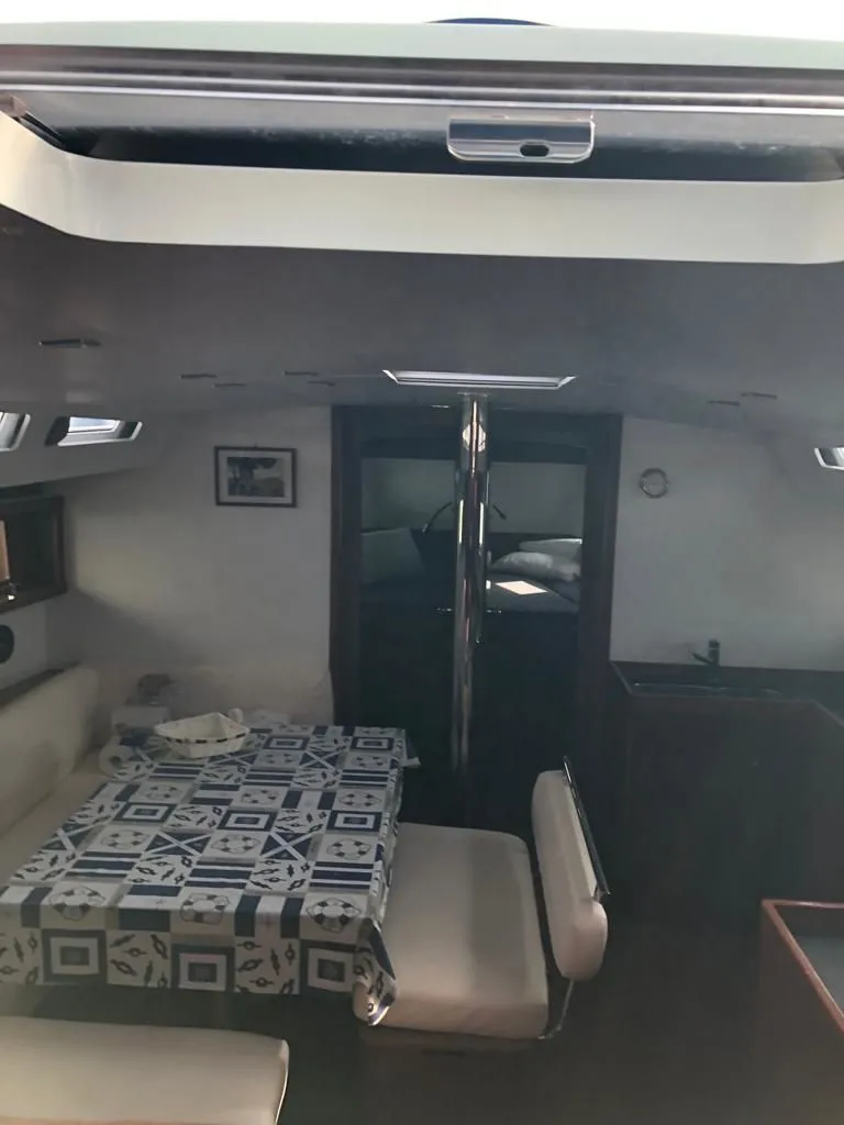 Explore Cannigione on a 14.6m Rental Beneteau Oceanis 48