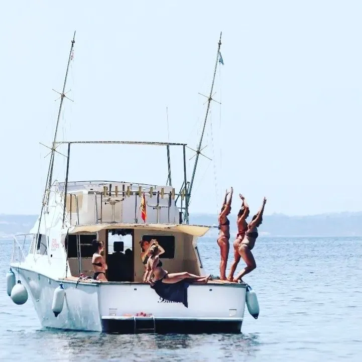 Explore Can Picafort on a 11m Rental Bertram 42