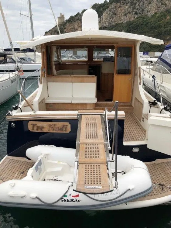 Explore Nettuno on a 14m Rental Boat