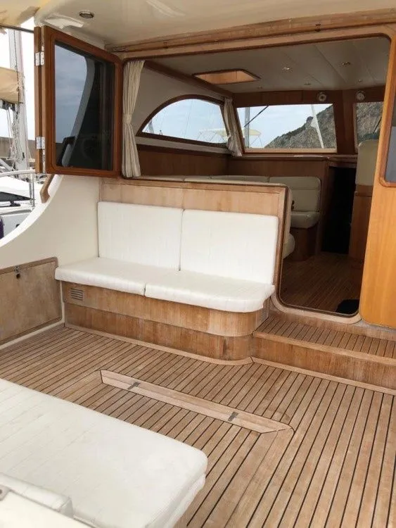 Explore Nettuno on a 14m Rental Boat
