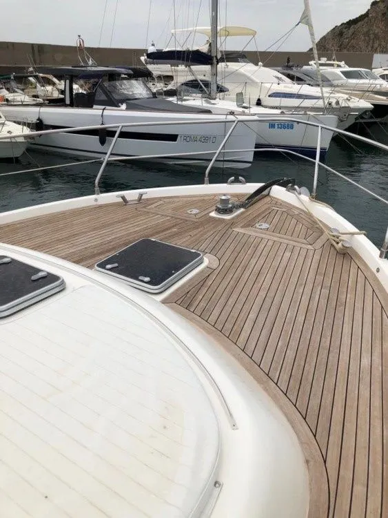 Explore Nettuno on a 14m Rental Boat