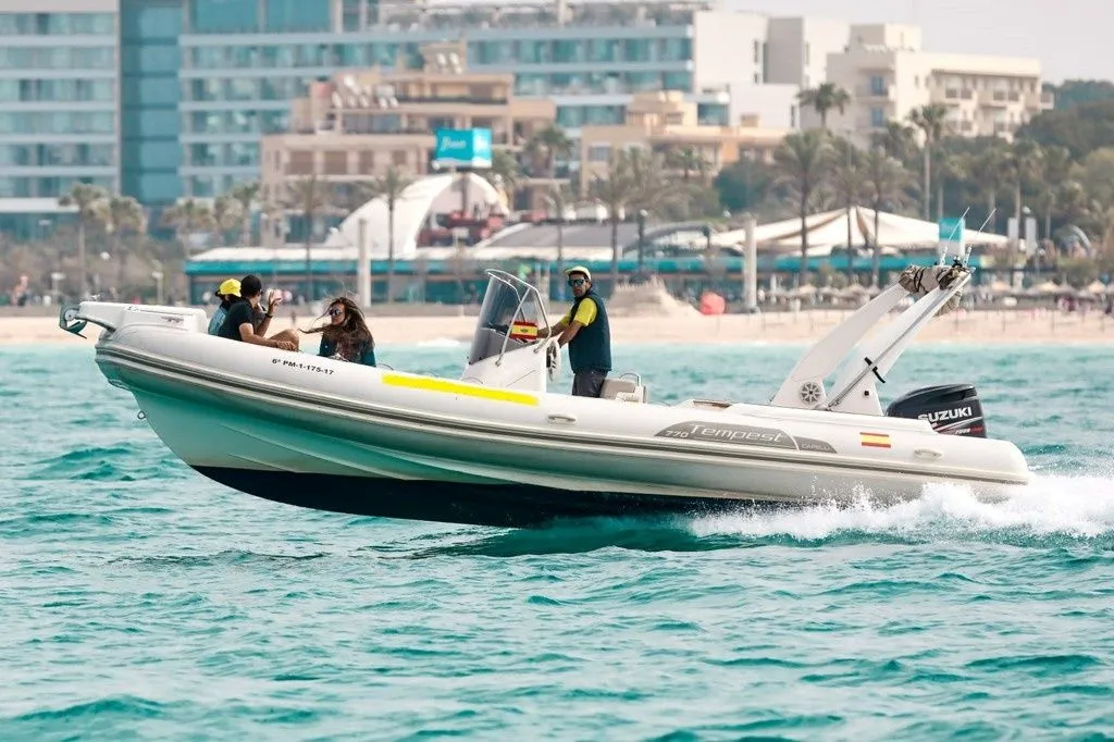 Explore Can Pastilla on a 8m Rental Motor Boat