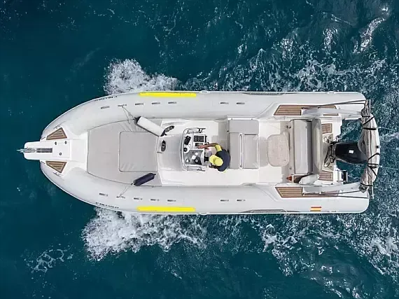 Explore Can Pastilla on a 8m Rental Motor Boat