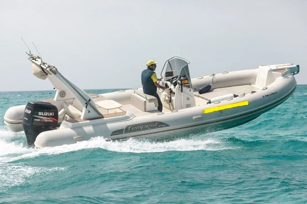 Explore Can Pastilla on a 8m Rental Motor Boat