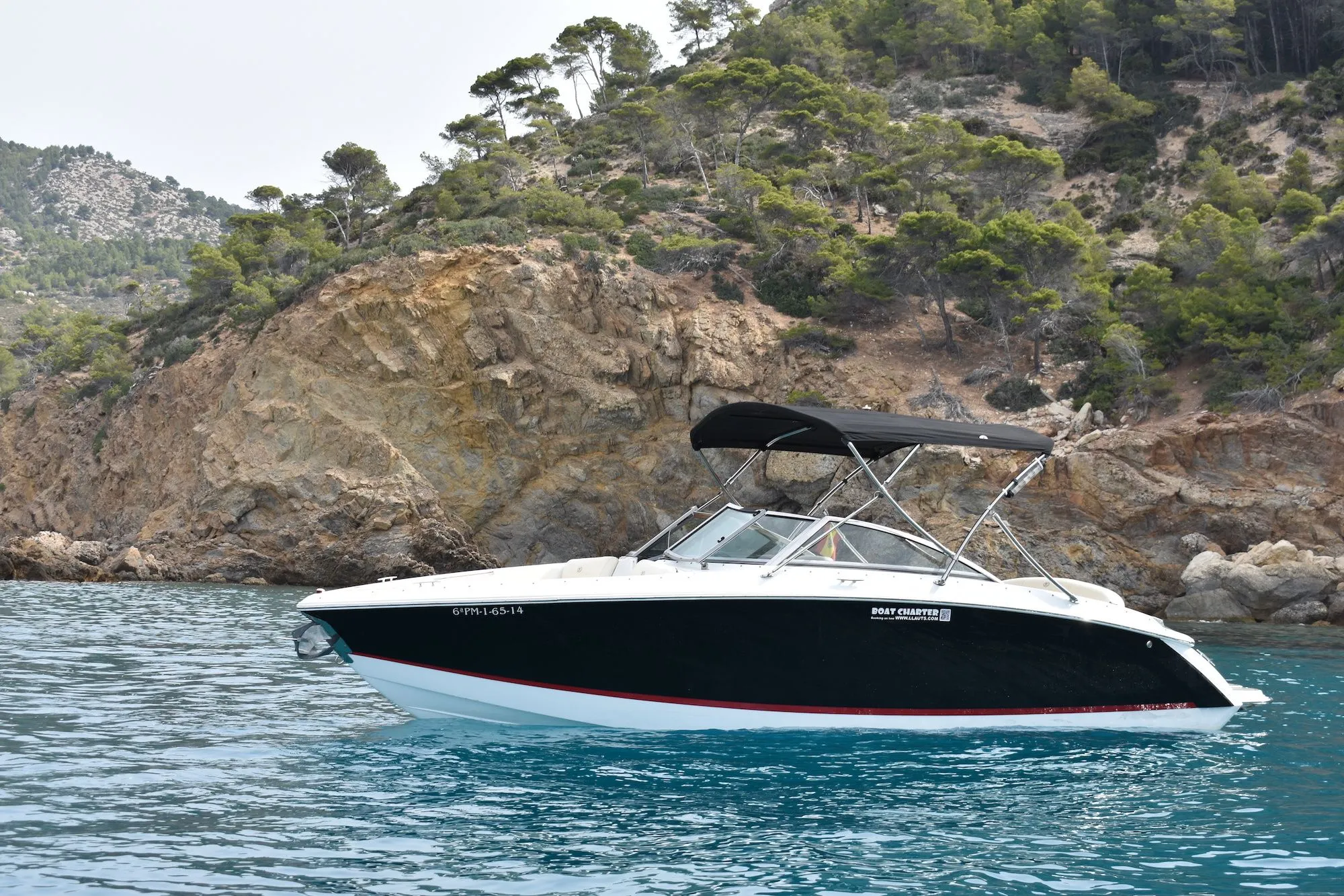 Explore Port d'Andratx on a 7.26m Rental Boat