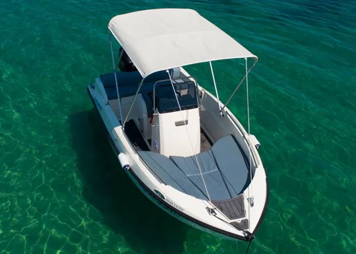Explore Nea Peramos on a 5m Rental Boat