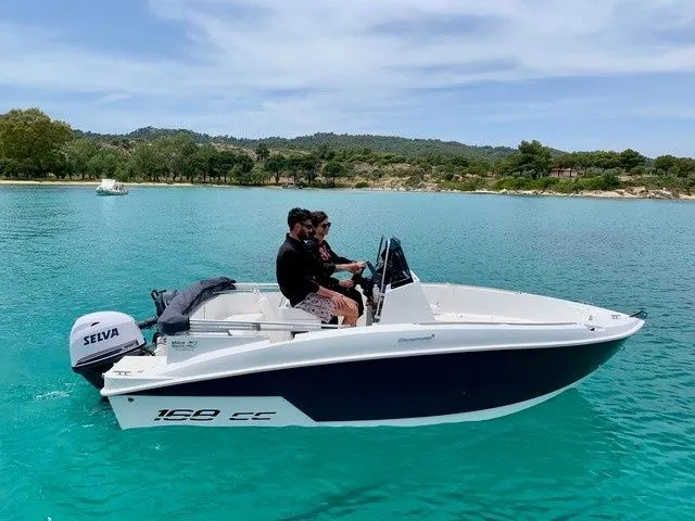 Explore Nikiti on a 5.1m Compass 168cc Motor Boat Rental