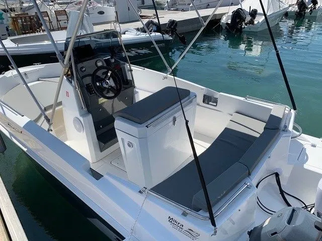 Explore Nikiti on a 5.1m Compass 168cc Motor Boat Rental