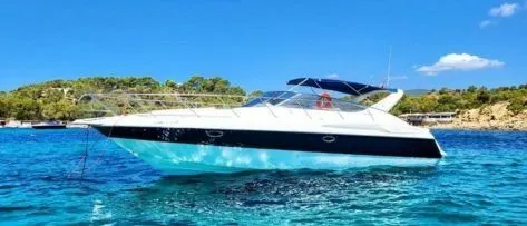 Explore Cala Jondal on a 11.9m Rental Motor Yacht Cranchi 39