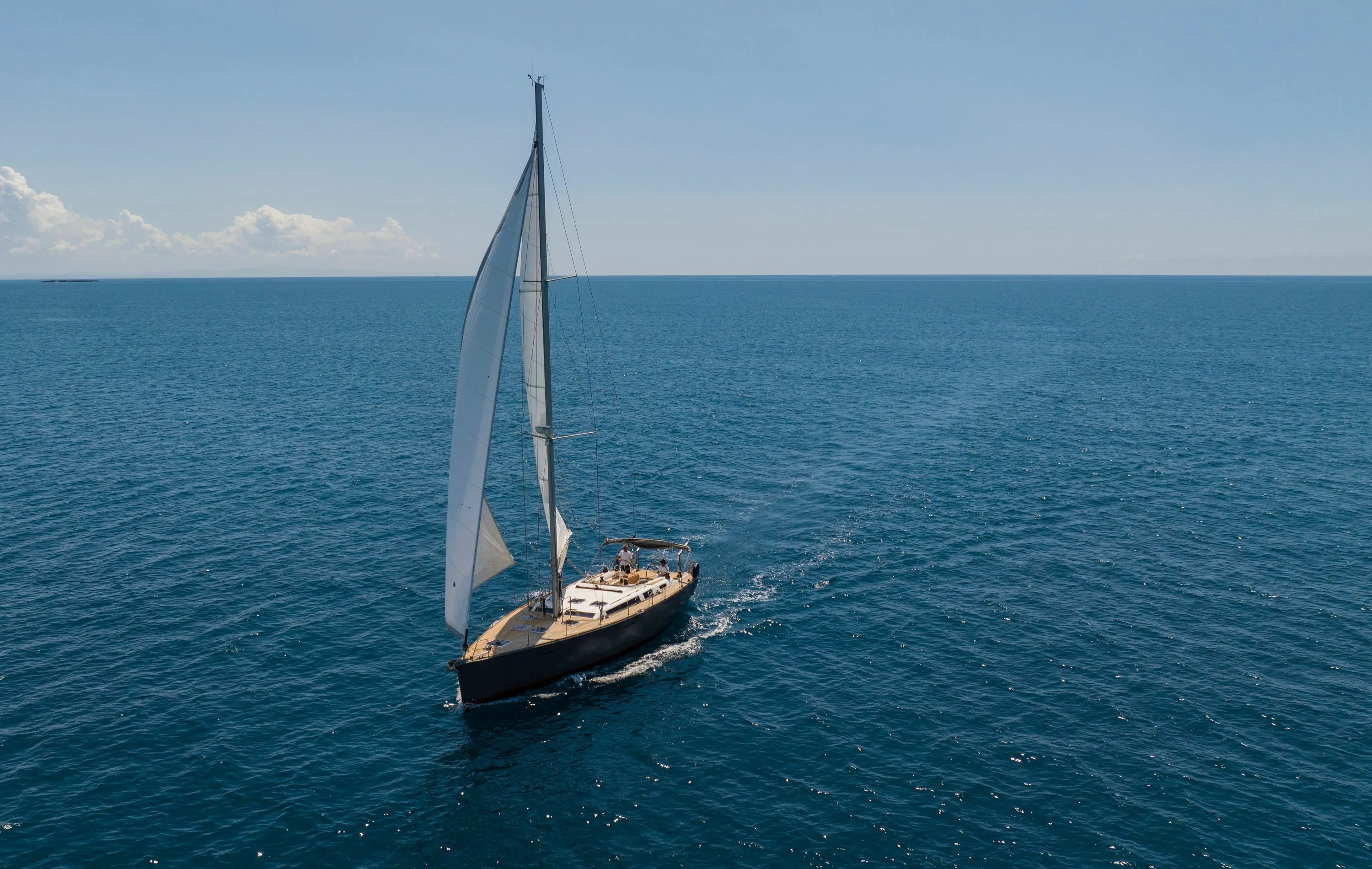 Explore Porto Pollo on a 16m 3 Cabin Sailing Yacht Rental