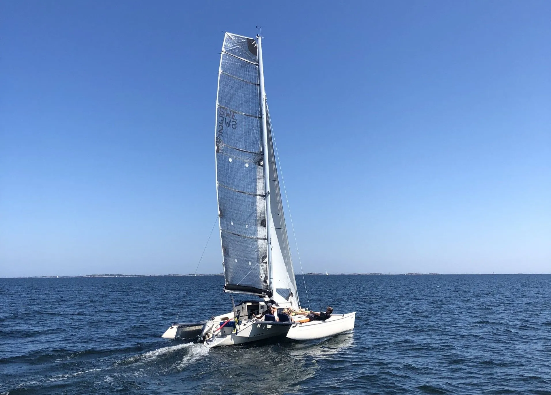 Explore Vaxholm on a 9m Rental Catamaran Gepard 28