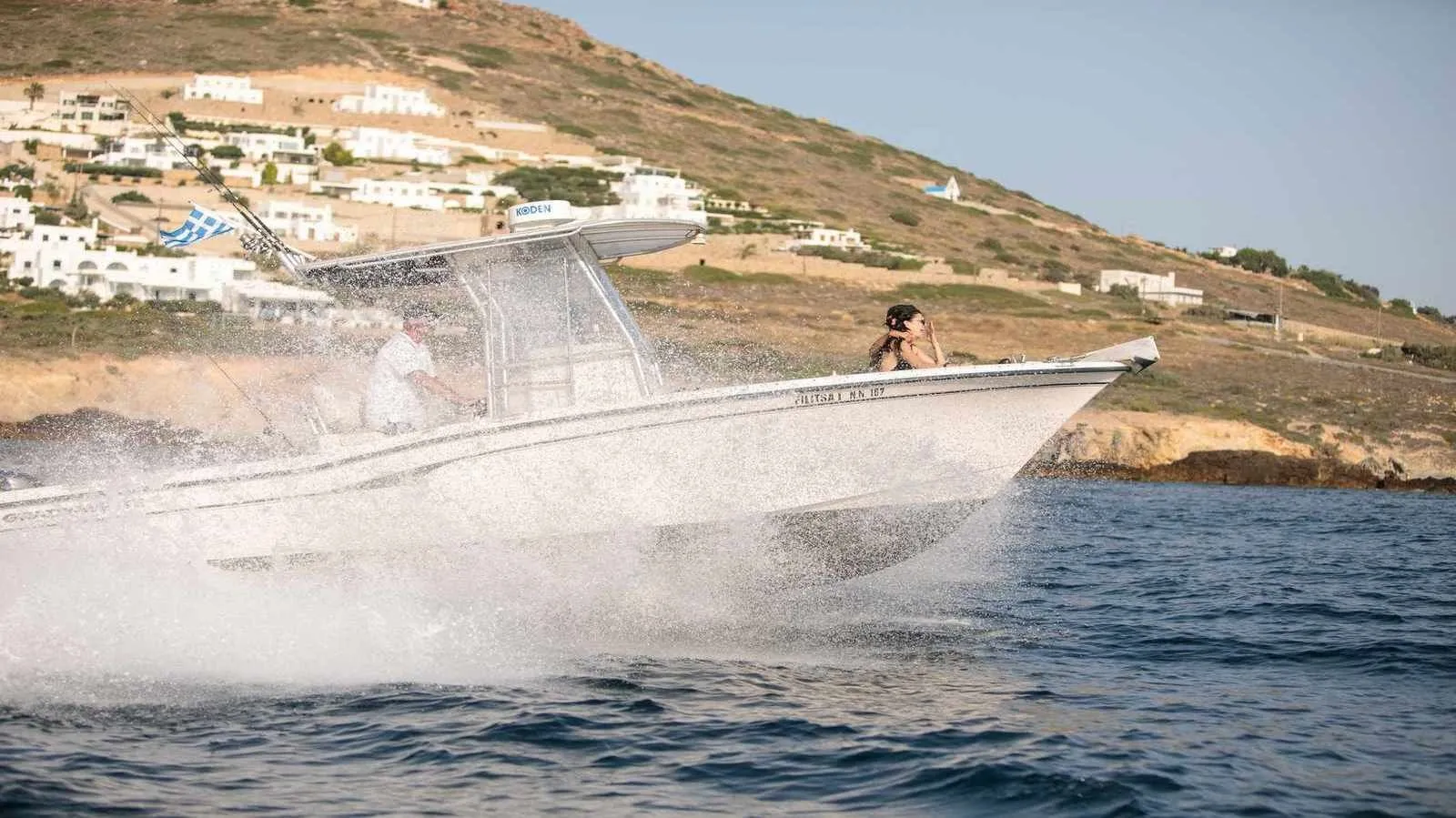 Explore Naxos Town on a 7.54m Grady White 257 Motor Boat Rental