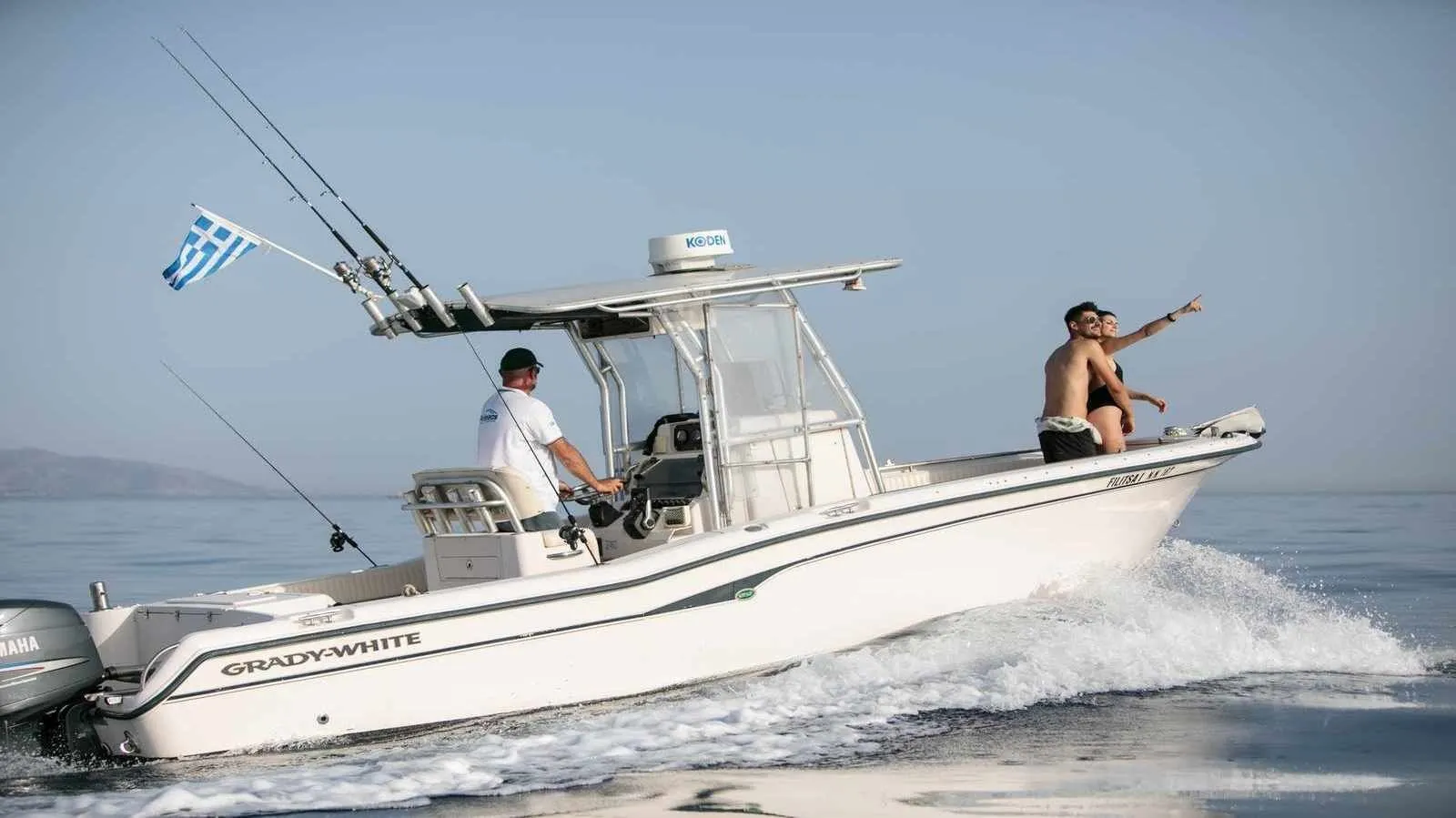 Explore Naxos Town on a 7.54m Grady White 257 Motor Boat Rental