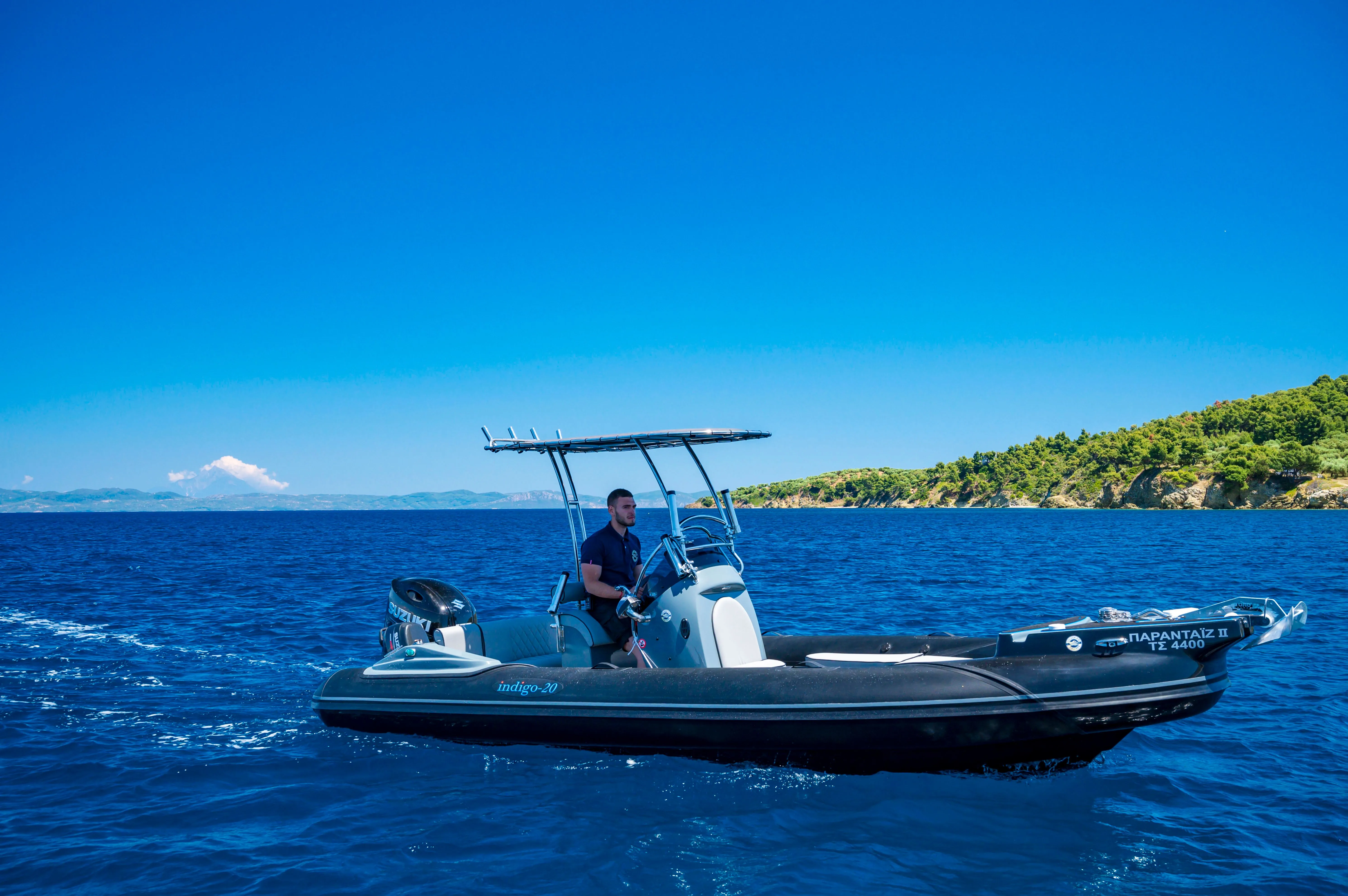 Explore Nikiti on a 6m Rental Motor Boat