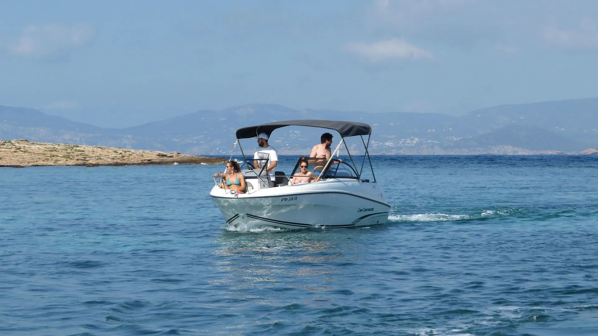 Explore Santa Eularia des Riu on a 6.5m Rental Motor Boat Jeanneau Cap Camarat 6.5 BR