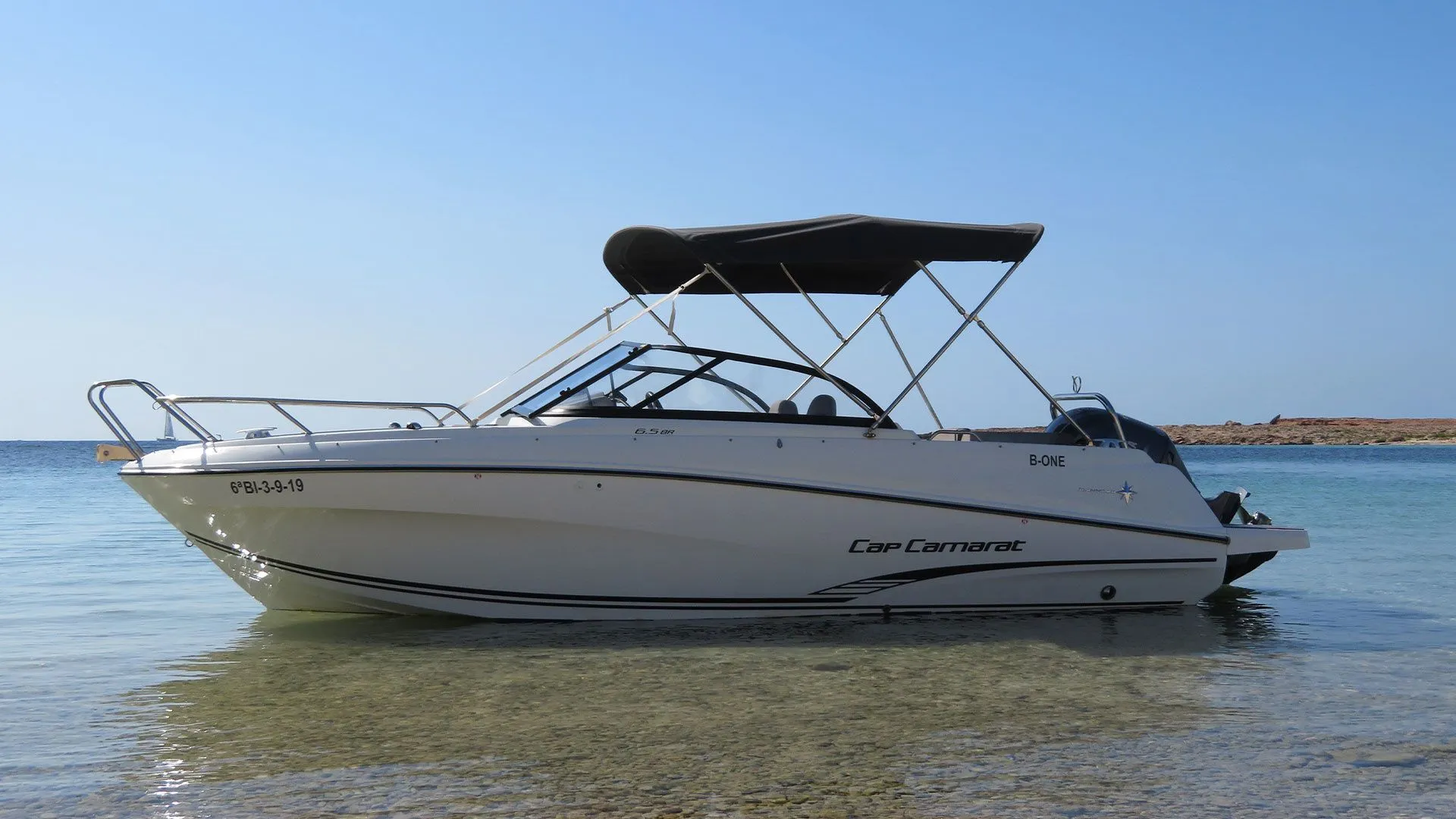 Explore Santa Eularia des Riu on a 6.5m Rental Motor Boat Jeanneau Cap Camarat 6.5 BR