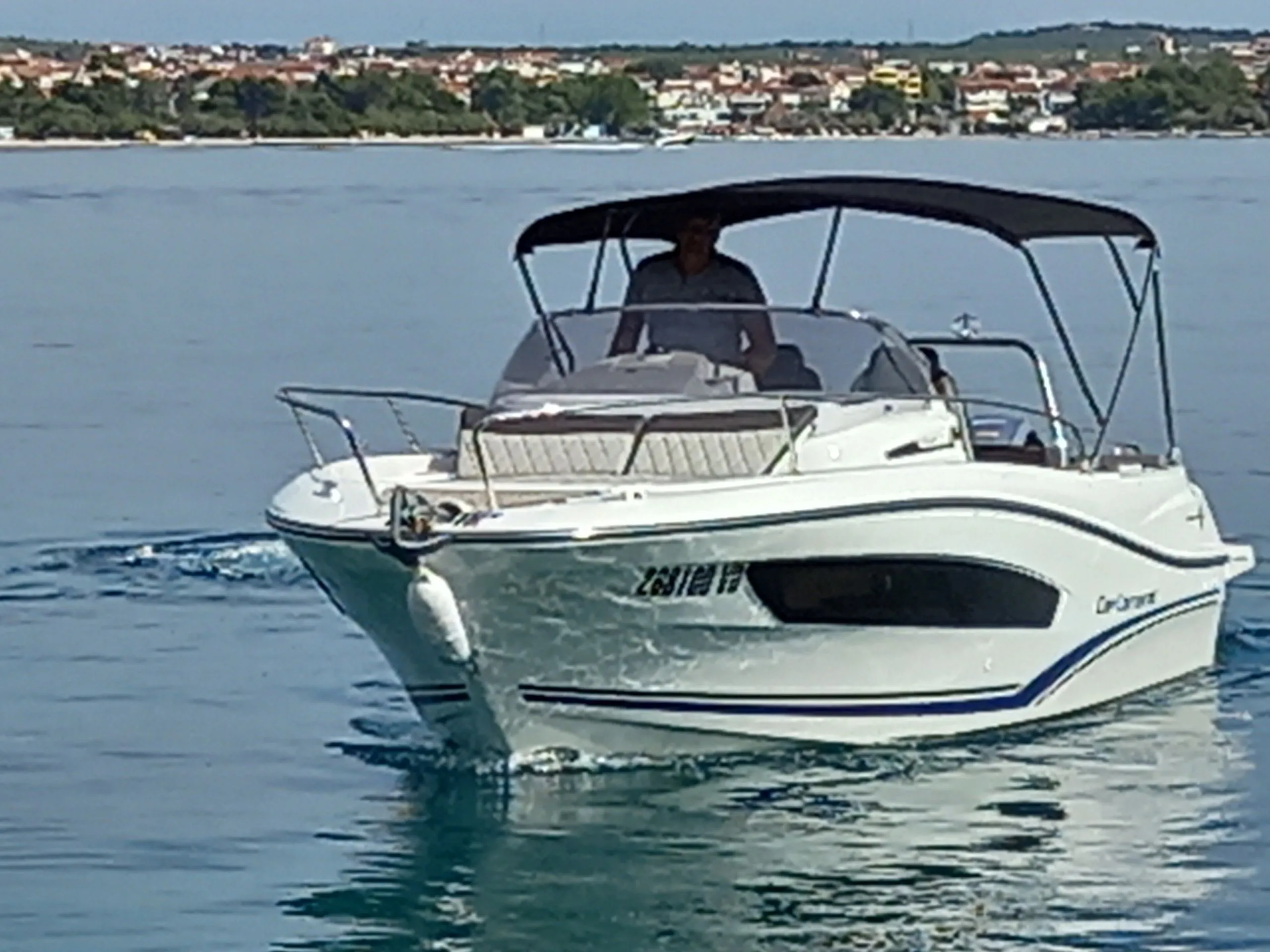 Explore Tribunj on a 7.6m Rental Jeanneau Cap Camarat 7.5