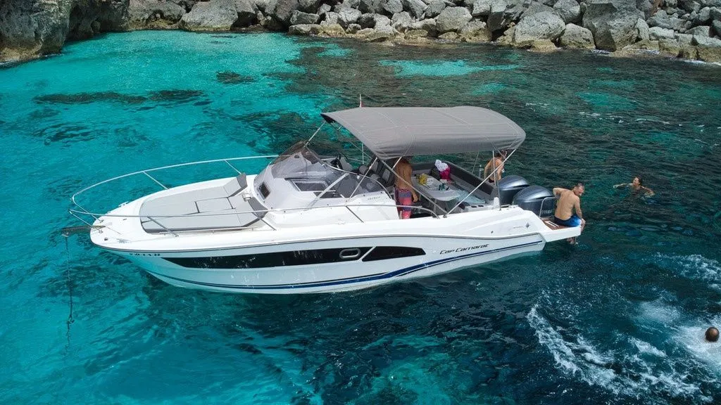 Explore La Savina on a 9m Rental Jeanneau Cap Camarat 9.0