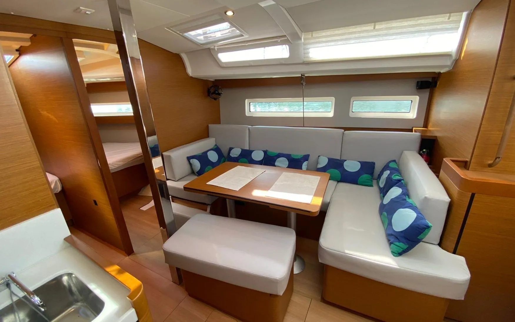 Explore Nettuno on a 13m Rental Jeanneau Sun Odyssey 440