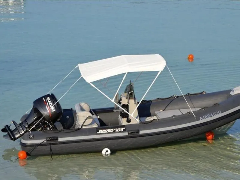 Explore Santa Giulia on a 4.95m Joker 470 Motor Boat Rental
