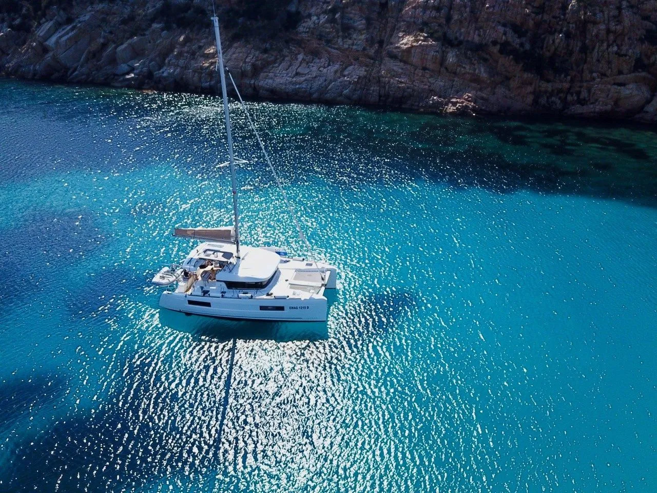 Charter a 11.74m Catamaran in Poltu Quatu