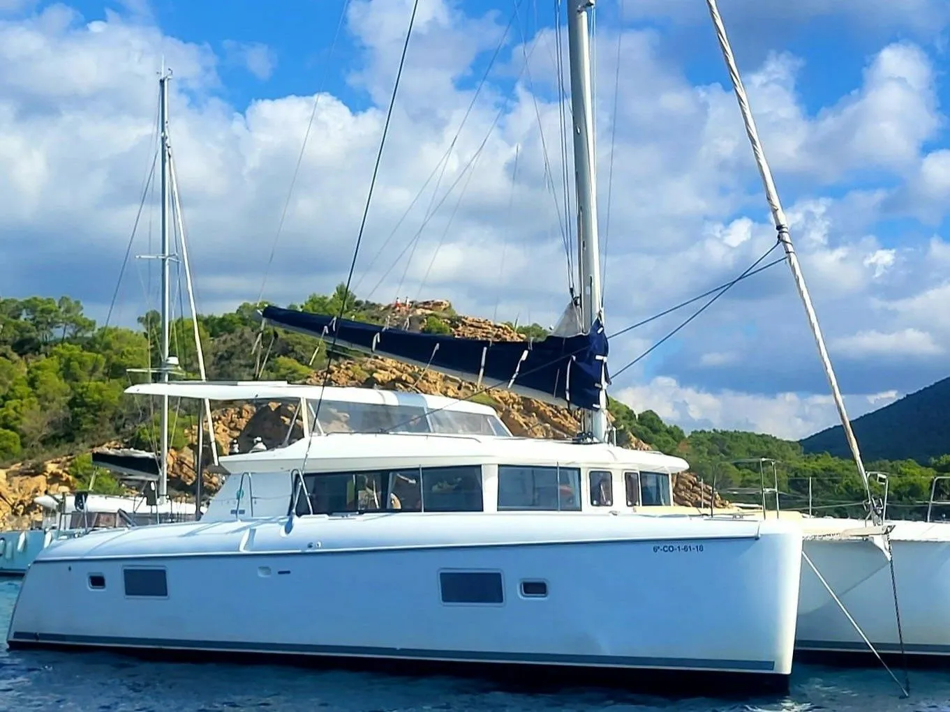 Explore Cala Jondal on a 12.8m Rental Lagoon 42