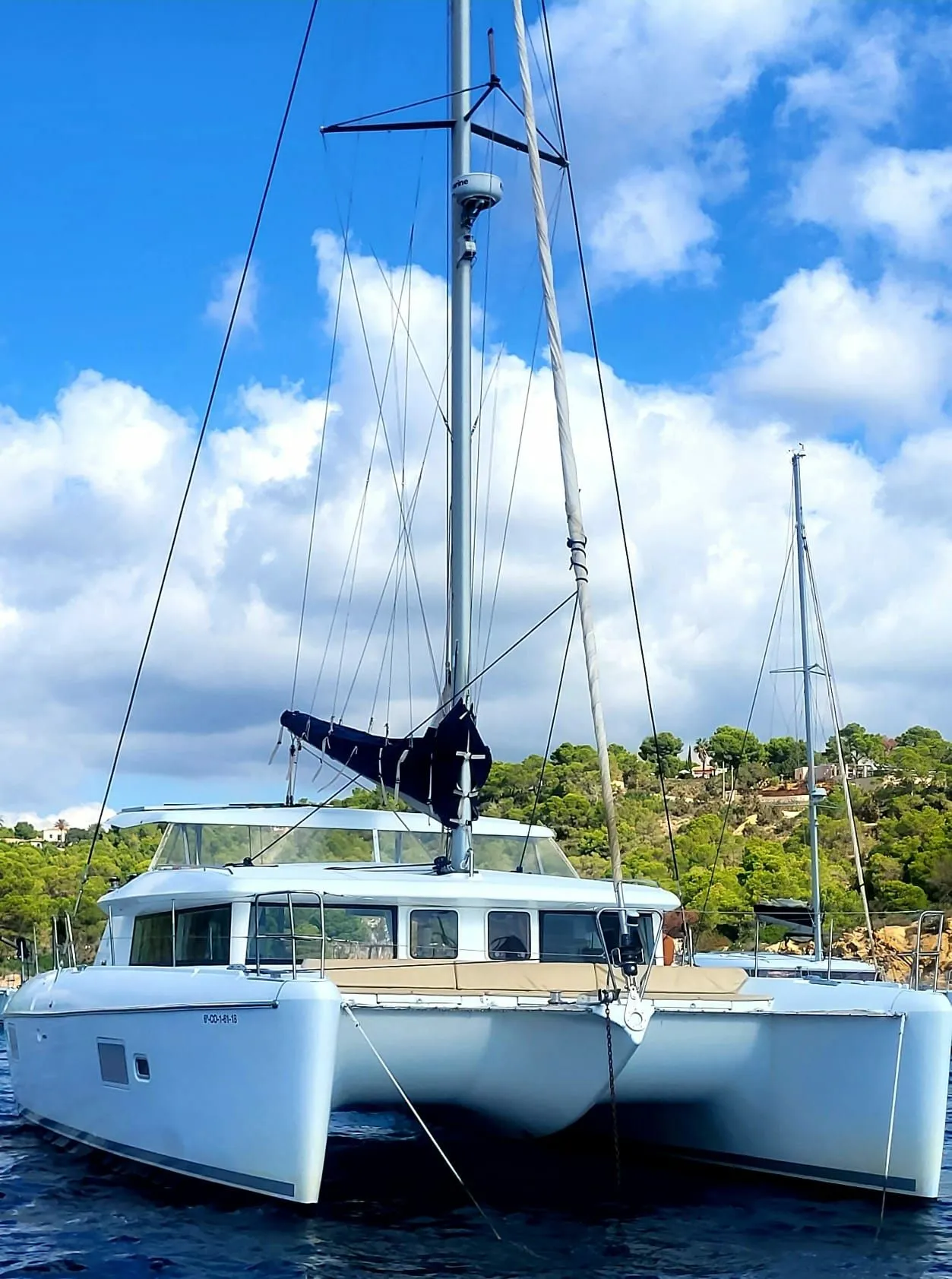 Explore Cala Jondal on a 12.8m Rental Lagoon 42