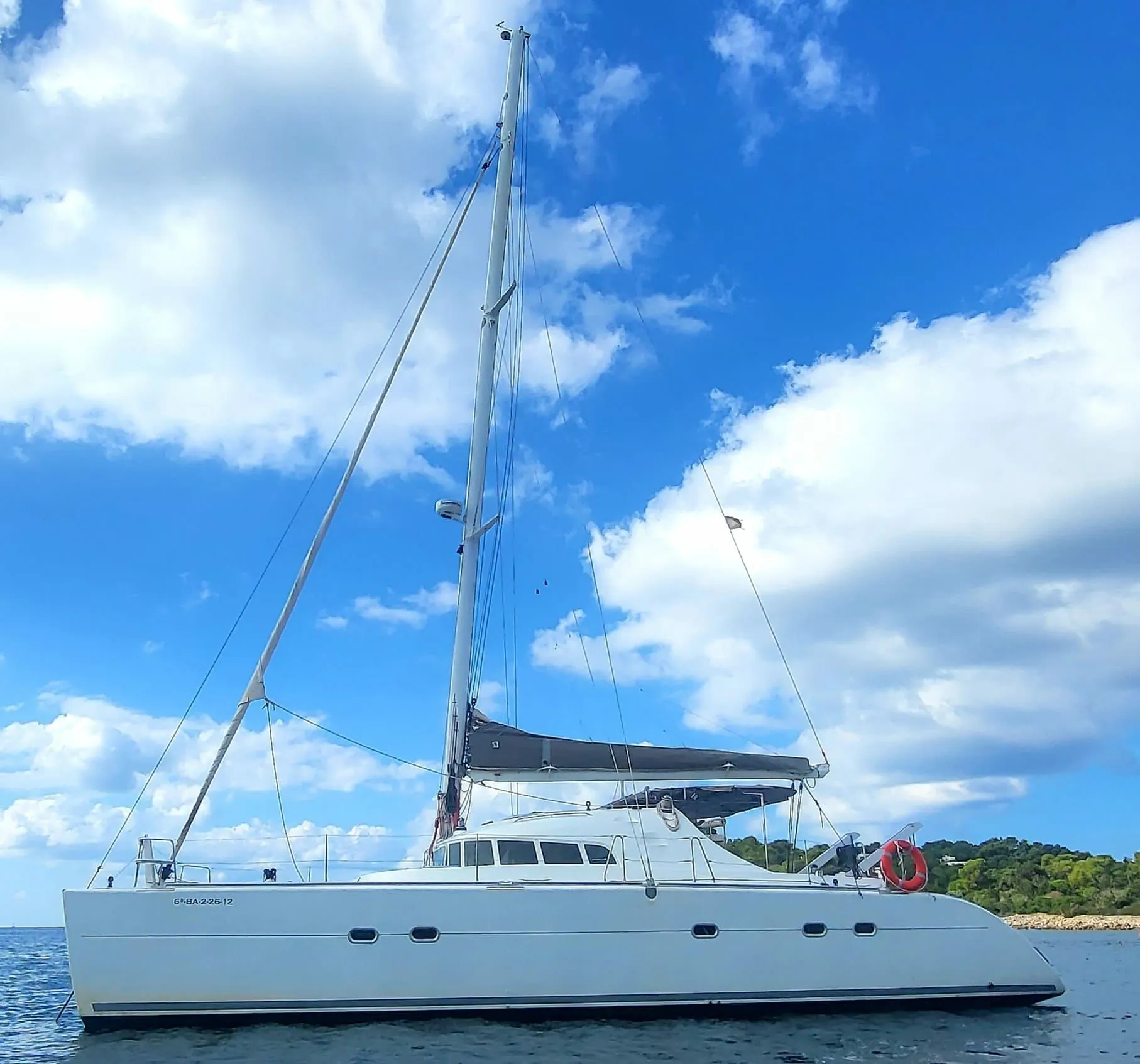 Charter a 15m Lagoon 470 in Cala Jondal