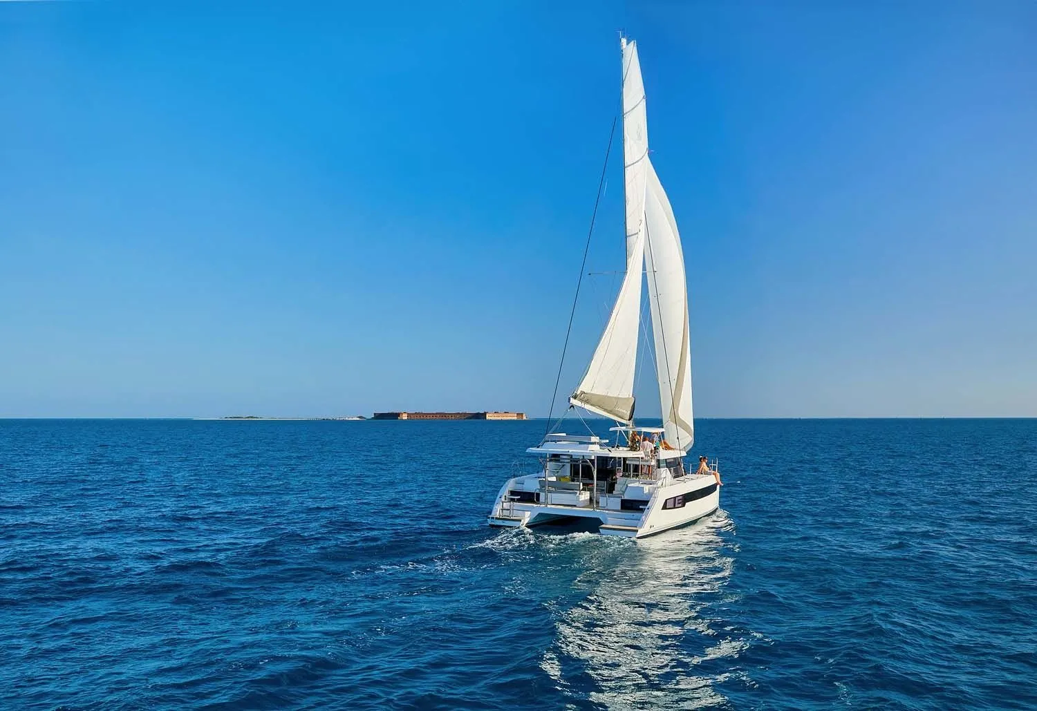 Charter a 12.67m 4 Cabin Catamaran in Cannigione