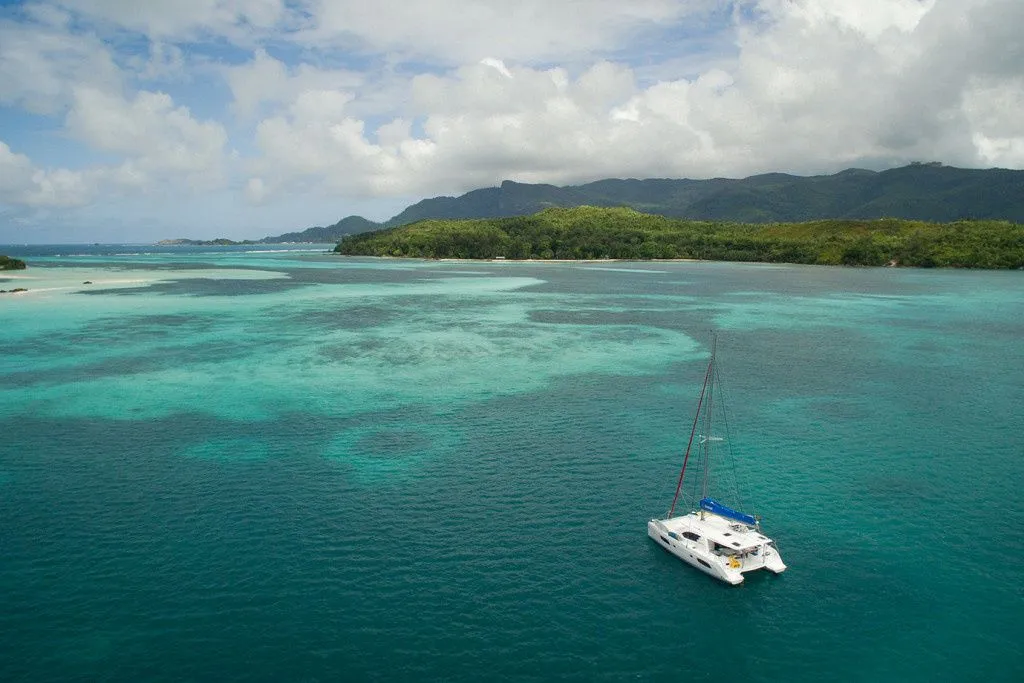 Explore Eden Island on a 14.75m 4 Cabin Catamaran Rental
