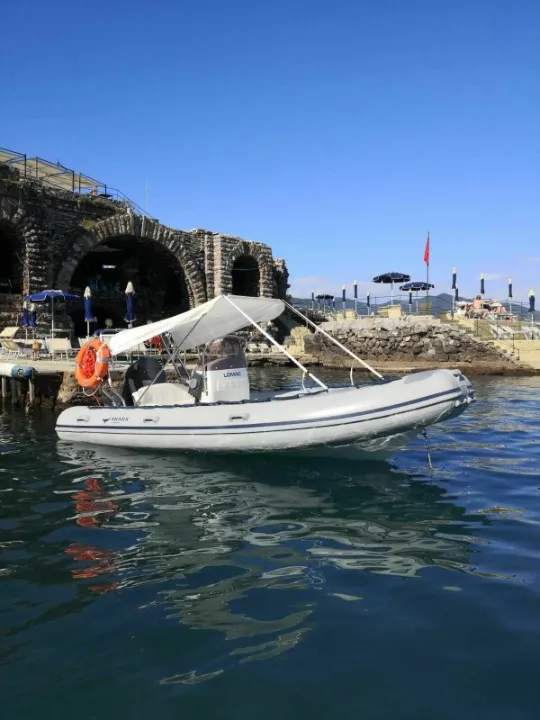 Explore Porto Santa Margherita on a 5.2m Rental Lomac 520