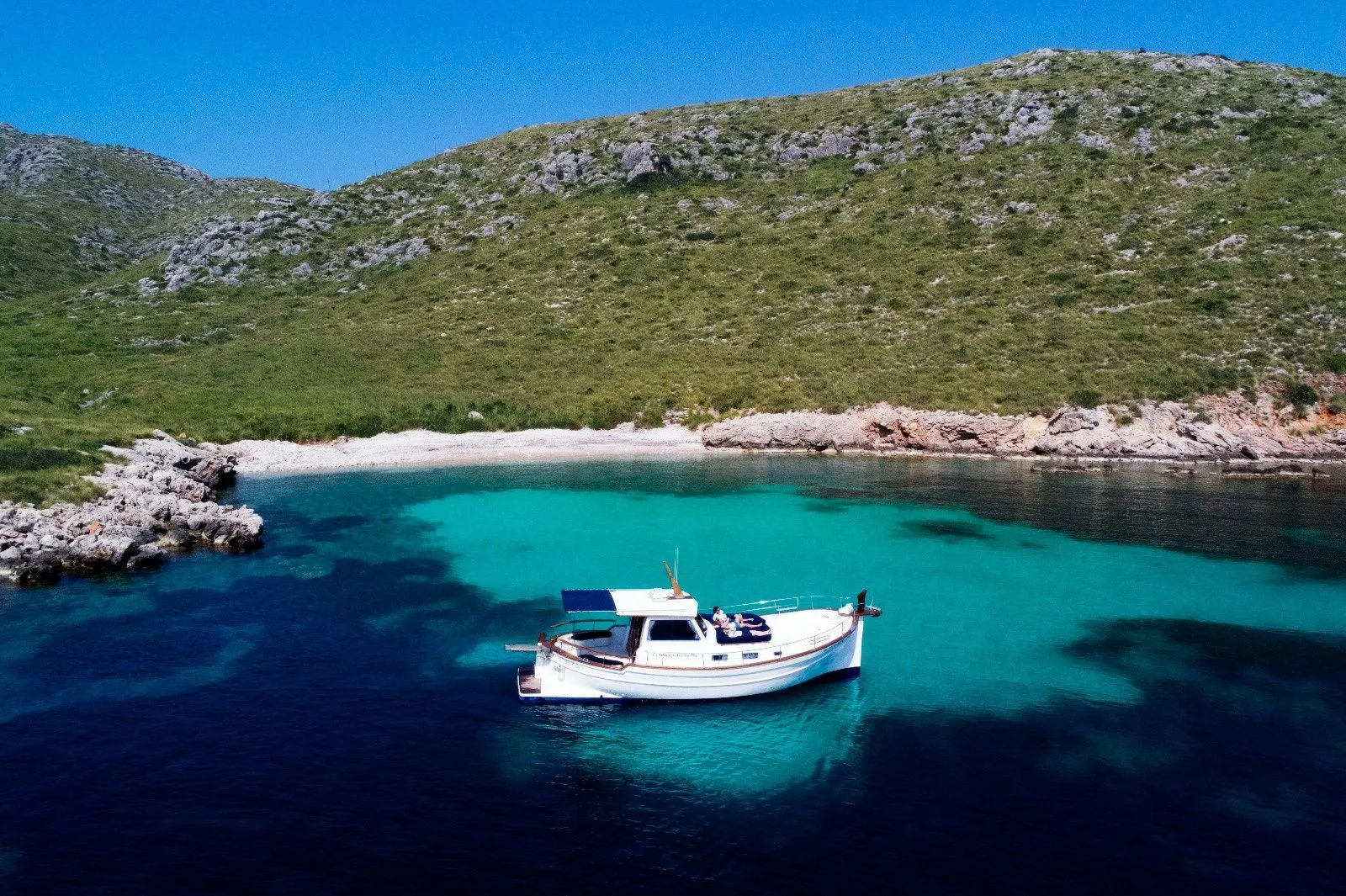 Explore Port de Pollensa on a 13m Rental Menorquin 130