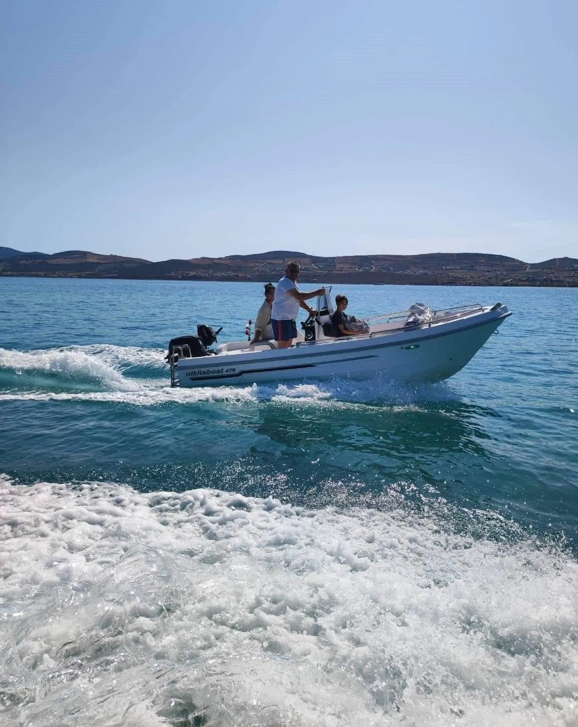 Explore Aliki on a 4.7m Rental Motor Boat