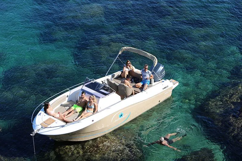 Explore La Savina on a 7.5m Rental Motor Boat