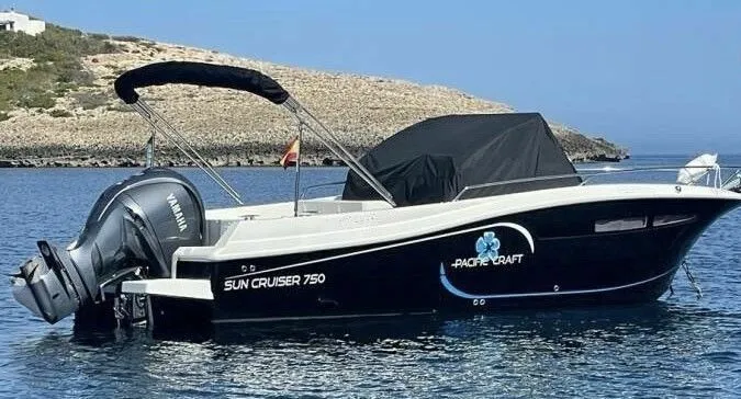 Explore Santa Eularia des Riu on a 7.5m Pacific Craft 750 Motor Boat Rental