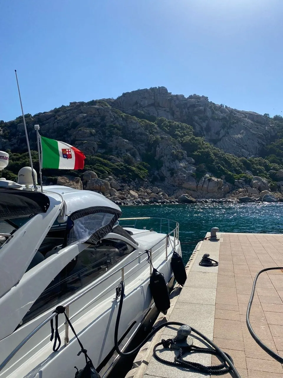 Explore Cannigione on a 14.2m Rental Pershing 45