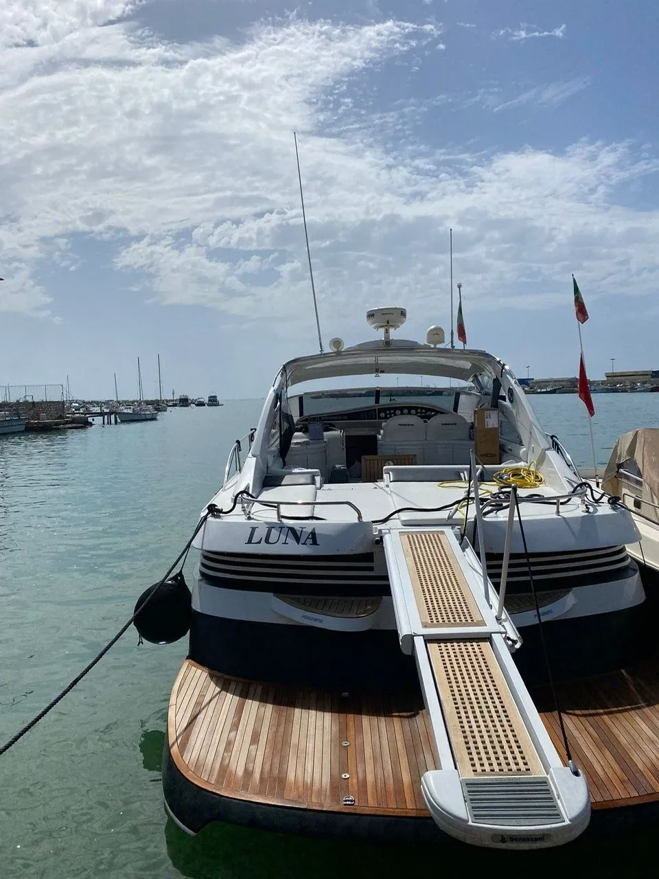 Explore Cannigione on a 14.2m Rental Pershing 45