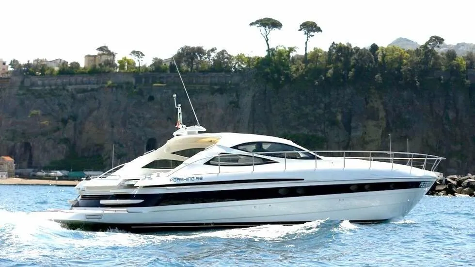 Charter a 16m Pershing 52 Motor Yacht in Poltu Quatu