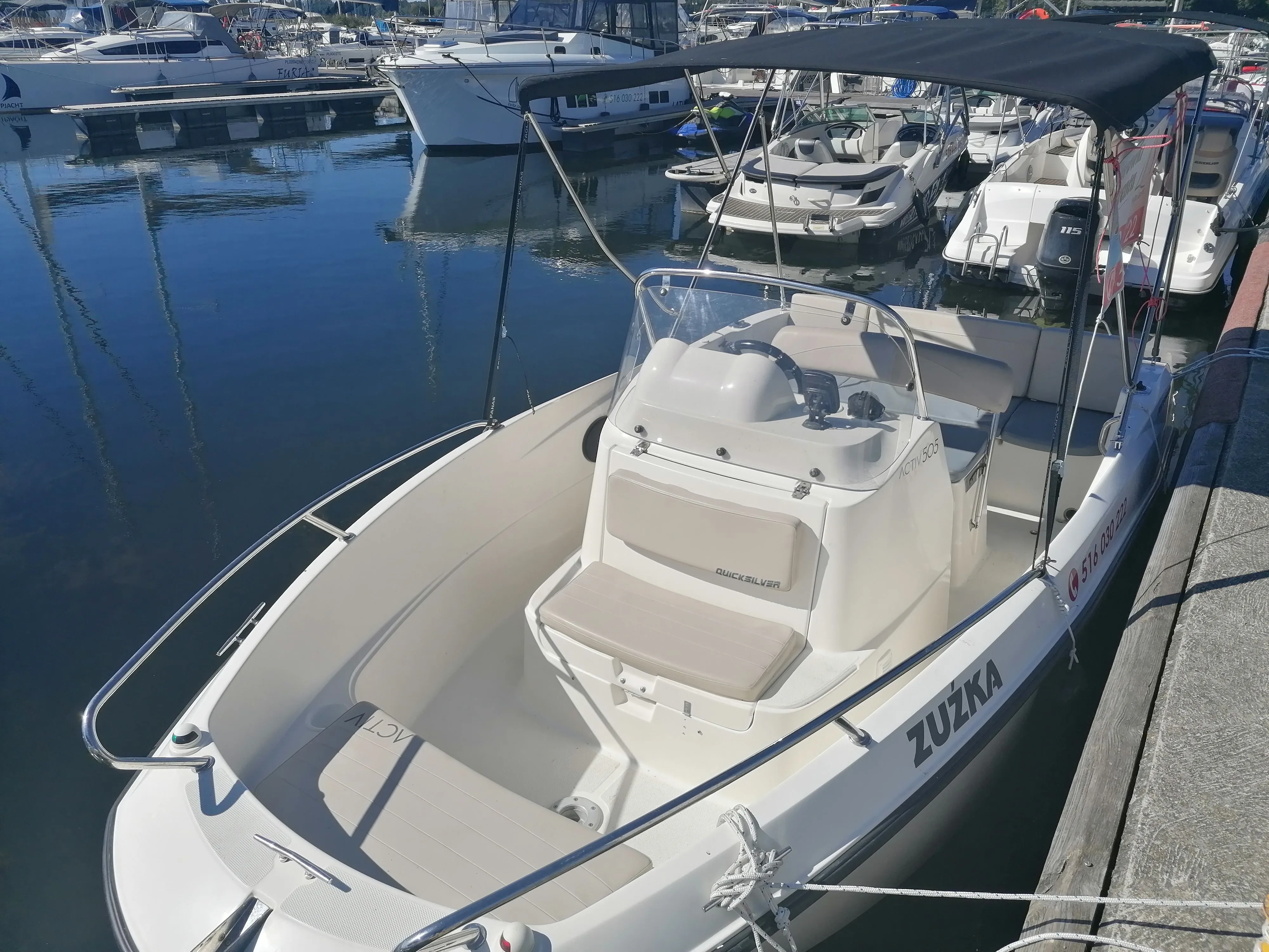 Explore Gizycko on a 5.05m Rental Quicksilver 505