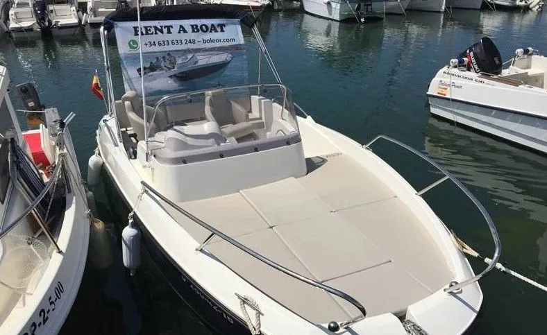 Explore Can Pastilla on a 6m Rental Motor Boat