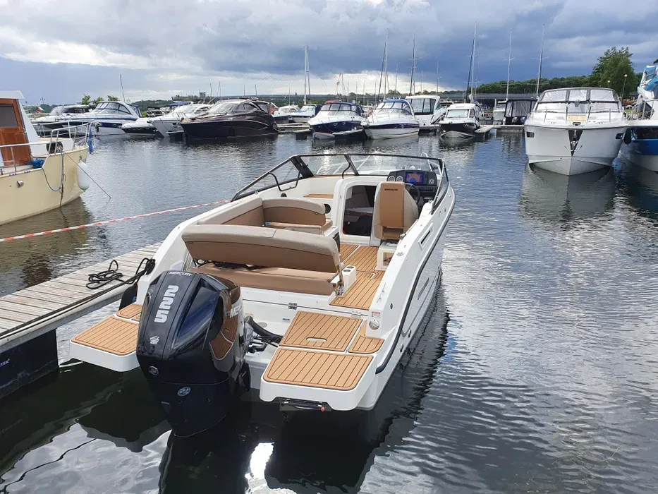 Explore Gizycko on a 7m Rental Motor Boat Quicksilver 675