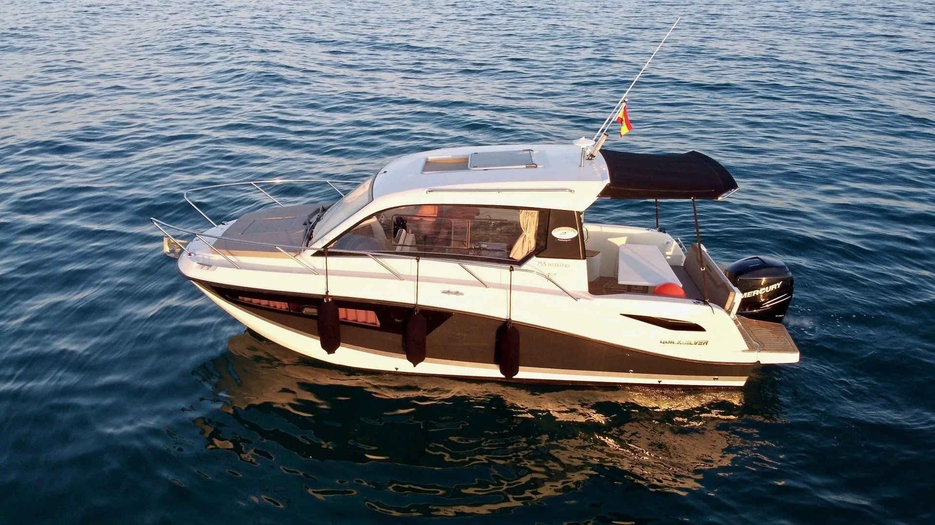 Rent a 8m Quicksilver 755 Weekend Motor Yacht in Sitges