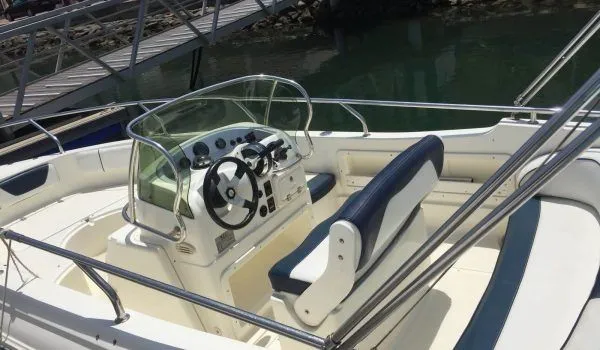 Explore Isla Canela on a 5.95m Rental Motor Boat Rancraft 20.20
