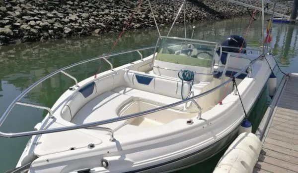 Explore Isla Canela on a 5.95m Rental Motor Boat Rancraft 20.20